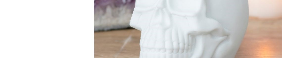 Wholesale skull-themed gifts and homeware including wall art, spirit boards, incense burners and storage jars. Perfect for gothic, mystical and alternative retailers. No minimum order and worldwide shipping.