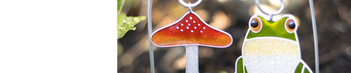 Ethically sourced wholesale suncatchers, hand painted with designs inspired by butterflies, birds and flowers. Decorative hanging ornaments for shops worldwide.