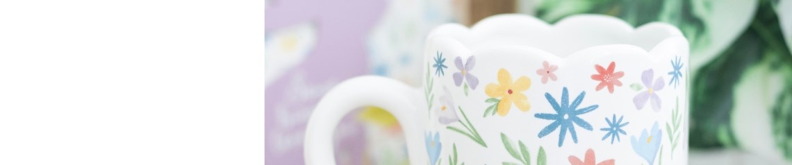 Spring and Easter-themed home decor and gifts with cute white bunny designs and pastel floral accents. Ideal for seasonal gift shops and baby or nursery displays. Ships worldwide with no order minimum.