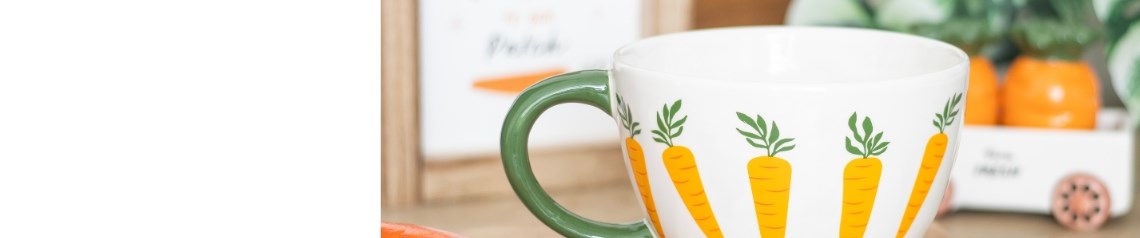 Whimsical carrot-themed home and garden decor collection, perfect for spring displays and Easter merchandising. Includes novelty ornaments and gifts for gardeners and seasonal retail ranges. No minimum order, ships worldwide.