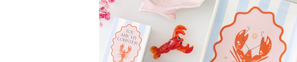 High Tide wholesale coastal decor collection with iridescent finishes, shell accents, and ocean-inspired details. Soft pastel tones and mermaid shimmer bring a modern seaside look to gifts and interiors. No minimum order and worldwide shipping available.