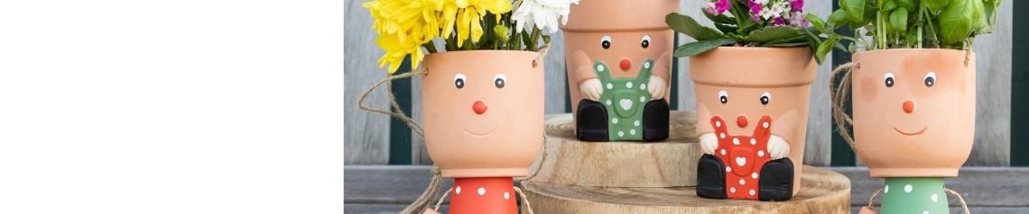 Garden-themed wholesale gift range including boot planters, bird houses, insect hotels and outdoor signs. Great for nature lovers and garden centre retail.