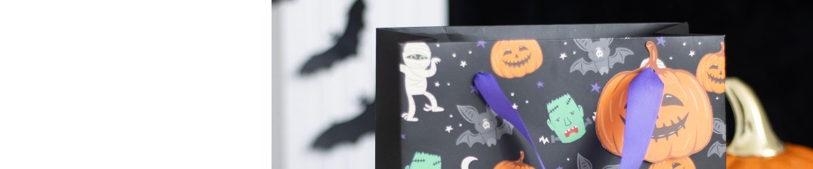 A fun Halloween collection featuring colourful monster-themed decorations and novelty items, ideal for creating playful seasonal displays.