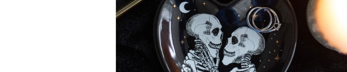 Alternative wedding and celebration decor with bold skeleton motifs in black and gold. Unique gothic giftware perfect for modern weddings. No minimum order, fast global shipping.