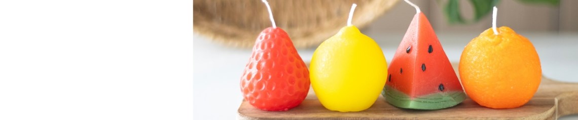 Tutti Frutti wholesale gift collection bursting with vibrant summer colours and juicy scents, including fruit-shaped candles, oil burners, incense holders, and fruity giftware. Featuring watermelon, strawberry, lemon and orange designs, this playful range is ideal for gift shops and lifestyle retailers wanting fresh, zesty decor and fun impulse buys.