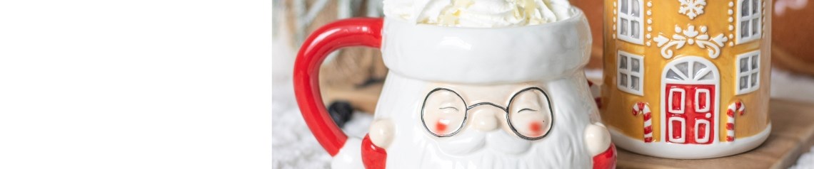 A festive Christmas giftware range featuring Santa mugs, gingerbread-themed decor, and cosy holiday accessories. The collection includes ceramic houses, novelty keyrings, Santa oil burners, and seasonal doormats with cheerful designs. Perfect for garden centres and seasonal shops.