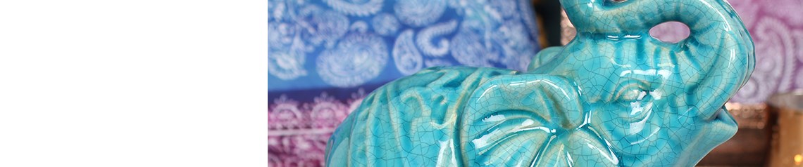 Wholesale elephant-themed gifts and homeware. Includes ornaments, incense holders and hanging decorations
