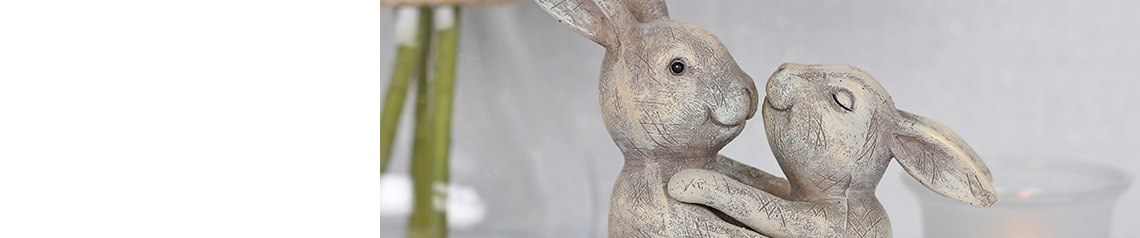 Bestselling resin animal ornaments featuring family groups of rabbits, elephants, dogs and penguins. Ethically sourced wholesale gifts for home and garden retailers. No order minimum, ships worldwide.