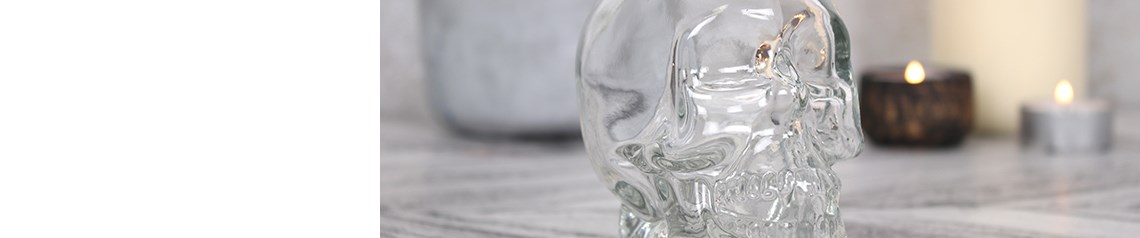 Wholesale skull decorations and giftware. Includes wall art, spirit boards, incense burners and decorative accents.