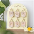 Set of 24 Mini Hanging Daisy Signs on Display