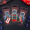 Set of 24 Retro 80s Keyrings on Display