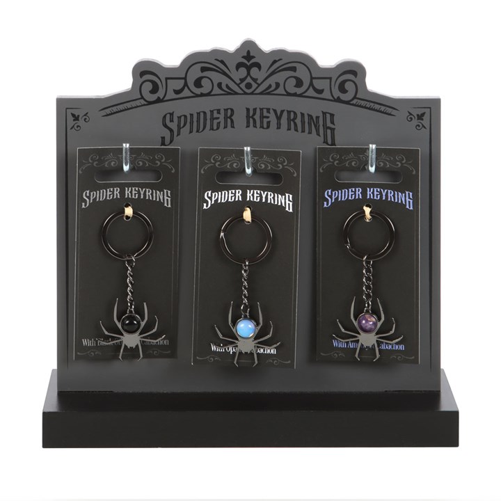 Set of 18 Crystal Spider Keyrings on Display