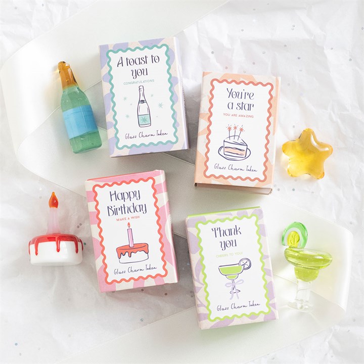 Set of 24 Glass Celebration Charms in Display