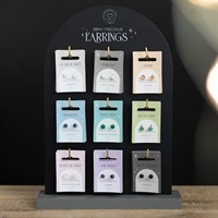Set of 36 Semi Precious Crystal Earrings on Display